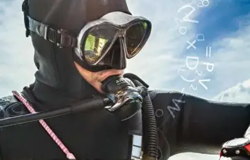 Atlantic Scuba Adventures Diver above water checking watch