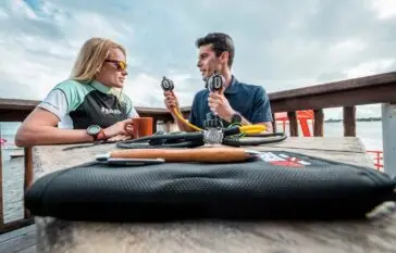 Atlantic Scuba Adventures Instructor gives instructions to course participant on deck