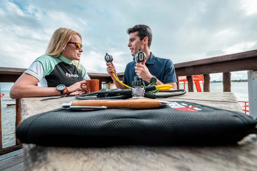 Atlantic Scuba Adventures Instructor gives instructions to course participant on deck