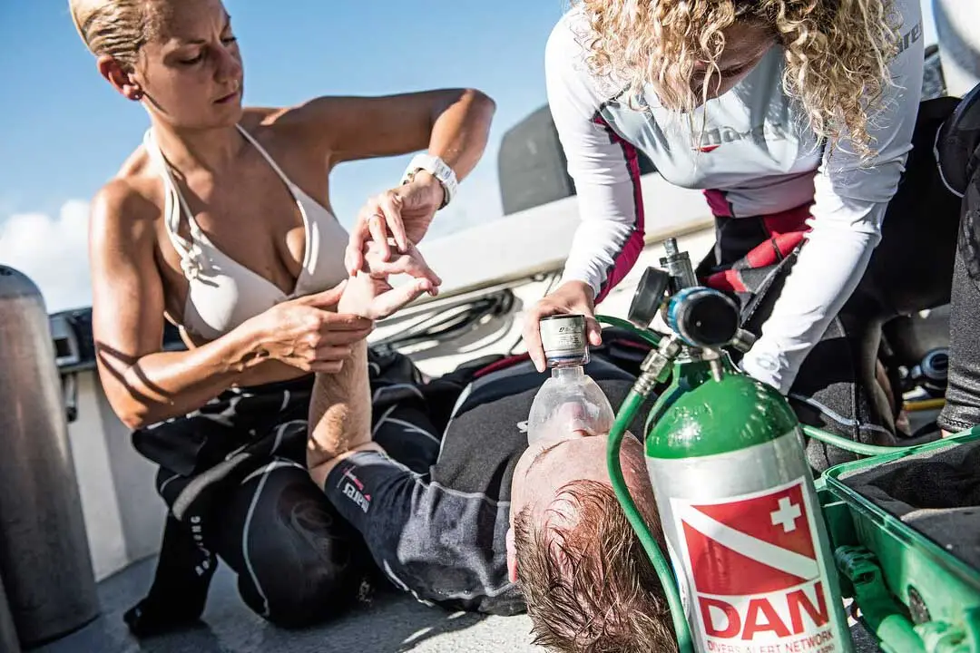 Two Atlantic Scuba Adventures Diver resuscitating diver on deck